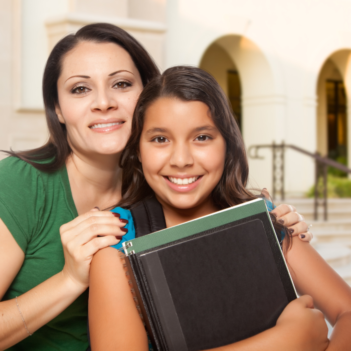 Working mother with daughter in transition from summer vacation to back to school