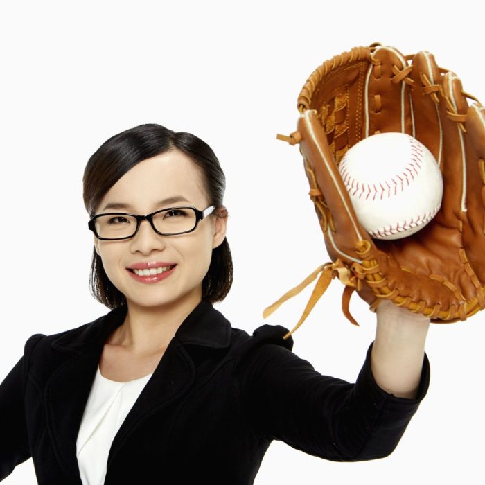 Woman catching life curveball